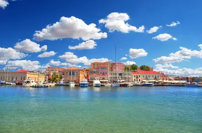 a view of a harbor with boats in the water at Dimosthenis by Vintage Travel in Stalos