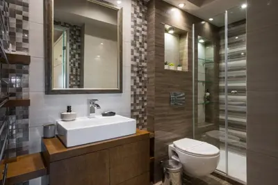 a bathroom with a sink and a toilet and a shower at Zen Luxury Studio in Kalamaki Chanion