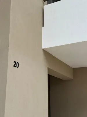 a building with the number on the wall at Etherio Urban Loft in Chania Town