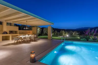 an image of a house with a swimming pool at Villa Ianira in Kolymvari