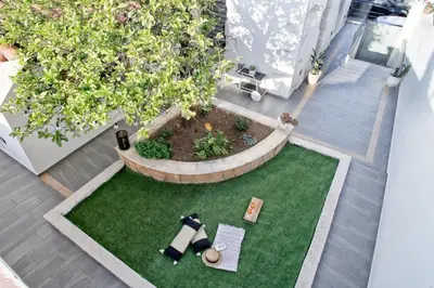 an overhead view of a garden with a table and chairs at Serena Residence in Chania Town