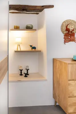 a room with white walls and wooden shelves at Casa Ellini unique & spacious by 8essentially in Kókkinos Pírgos