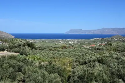 a view of the ocean from a hill at Evans Villas in Kissamos