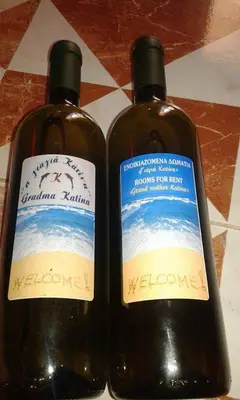 two bottles of wine sitting next to each other at Gradma Katina in Plataniás