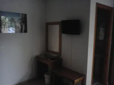 a bathroom with a sink and a mirror on the wall at Gradma Katina in Plataniás