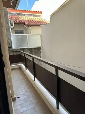 a view from a balcony of a building with a railing at Haris home 1 in Chania Town
