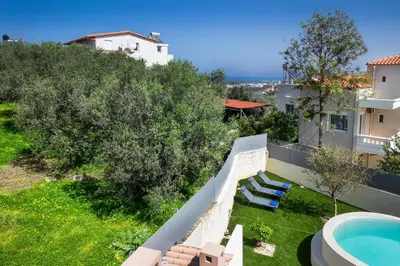 an aerial view of a villa with a swimming pool at Casa BI LA in Galatás