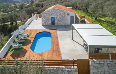 an overhead view of a house with a swimming pool at Villa Lakioto in Dhémbla