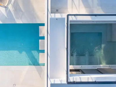 an open door to a swimming pool on a boat at Etheria Elli Villa, Retreat to Ethereal Luxury and Wellness by etouri in CHQ