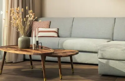 a living room with a couch and a coffee table at Raviewha Luxury Apartments 2 in Ravdhoúkha