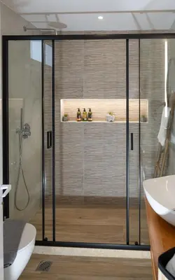 a bathroom with a shower and a toilet and a sink at View West Elafonisi house in Livadia