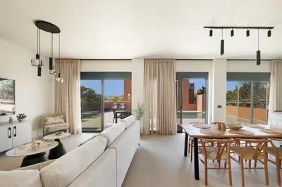 a living room with a couch and a table at Madre Tierra Boutique Villa 1 in Liyidhés