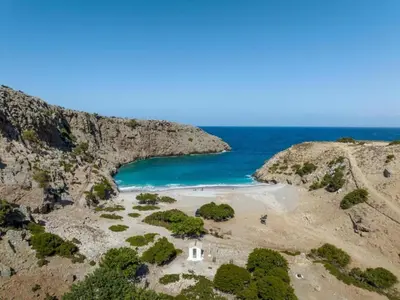 an aerial view of a beach with blue water at Seaview Studio in beautiful setting, west from Chania in Ravdhoúkha