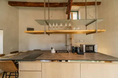 a kitchen with a counter with glasses on it at Panaretos Deluxe Maisonette in Chania Town
