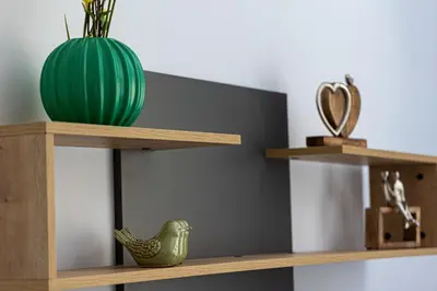 a green vase sitting on top of a wooden shelf at Cozy Light Nest Chania Crete in Kounoupidhianá