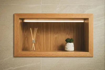 a wooden shelf with a plant and a vase on it at Kydoni Signature Apartment in Chania Town