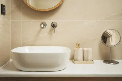 a white sink on a counter in a bathroom at Kydoni Signature Apartment in Chania Town