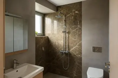 a bathroom with a shower and a toilet and a sink at Yalos Standard Studio - 5 mins to Elafonisi beach in Agios Padeleimon