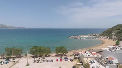 a view of a beach and the ocean at ARETOUSA Seafront House in Kalyves