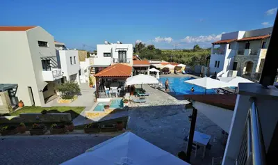 an aerial view of a resort with a swimming pool at Ledra Maleme Hotel in Maleme