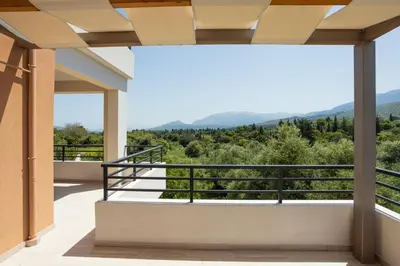 a balcony with a view of the mountains at Villa Andromeda Fres in Frés