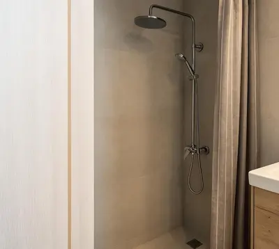 a shower with a glass door in a bathroom at Yalos Tiny Studio - 5 mins to Elafonisi beach in Agios Padeleimon