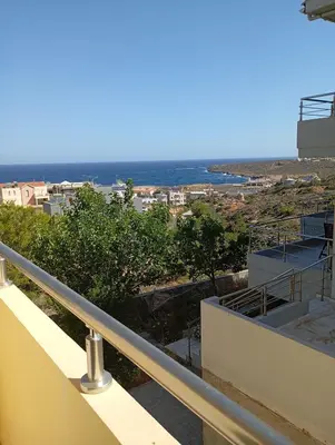 a view of the ocean from the balcony of a building at Maisonette in Koumpeli in Koumpeli