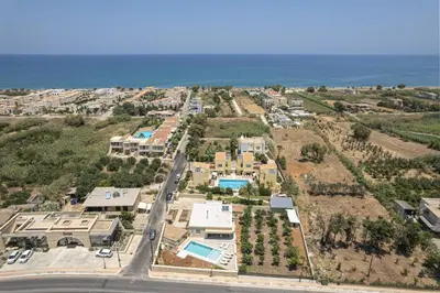 an aerial view of a resort with the ocean at Villa Portokalea in Maleme