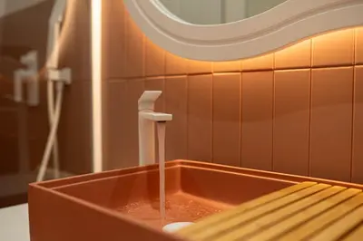 a sink with water running from a faucet at Madonna del Mare City in Chania Town
