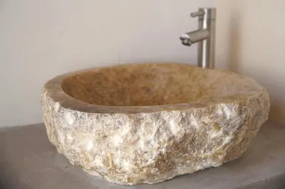 a stone tub sitting on top of a counter at The Village Hideaway - Traditional Stone House in Kissamos