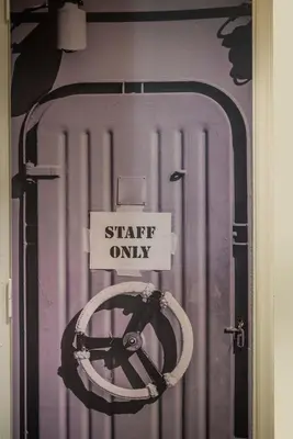 a door with a sign that says start only at Cosy 1st floor apartment at Koum Kapi Beach in Chania Town