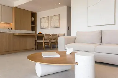 a living room with a couch and a table at Memoire Guest House I Private Heated Pool I 200m beach in Chania Town