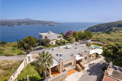 an aerial view of a house with a swimming pool at Villa Crista in Áptera
