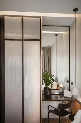 a room with a desk and a table with a chair at KT Suites in Chania Town