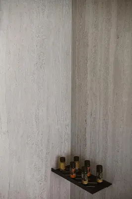 a shelf with four coffee cups on a wall at KT Suites in Chania Town