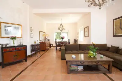 a living room with a couch and a table at Villa Ektor in Kissamos