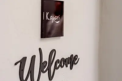 a sign that reads welcome on a wall at Kamari Apartment - Chania in Chania Town