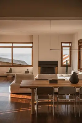 a living room with a table and a couch at Aeri Residence in Chania Town
