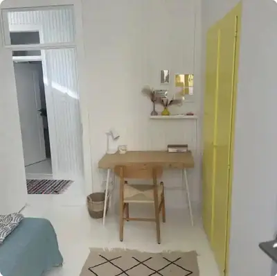 a small room with a table and a chair at Filoi Rooftop Boutique House,5pax in Chania Town