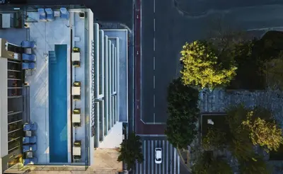 an overhead view of a street with a building at Hilton Garden Inn Chania City in Chania Town