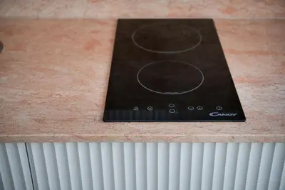a black book on a counter with a radiator at Eva's Apartment in Chania Town