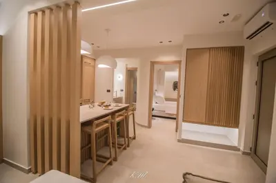a bathroom with a sink and a counter top at Kalmar mindful living in Palaiochóra