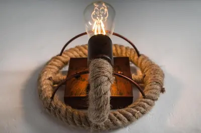 a light with a rope around it with a candle at Dream Art Studios in Chania Town