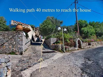 a stone path metres to reach the house at Polidoros vintage house 13 km from Elafonisi in Vathi