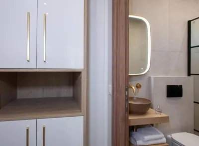 a bathroom with a sink and a mirror at Glafkos house with pool near the beach in Daratso