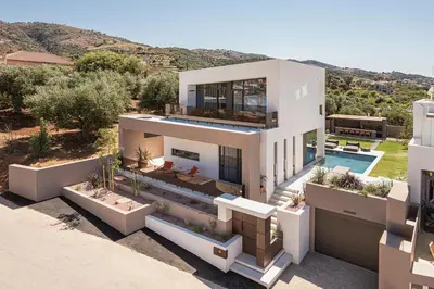 an aerial view of a white house at Villa Azahar Serene Luxury Living in Milonianá