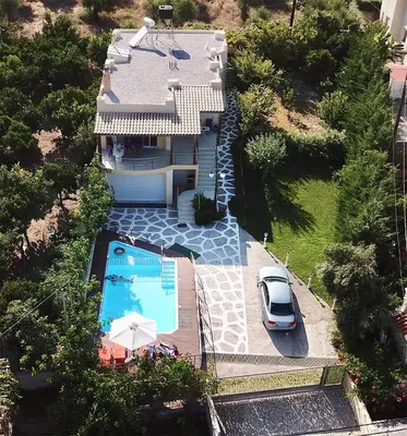 an aerial view of a house with a swimming pool at Villa Sofia Filoxenia in Kalyves
