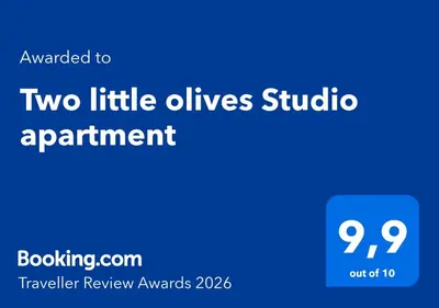two little olives studio apartment logo with a blue background at Two little olives Studio apartment in Kissamos