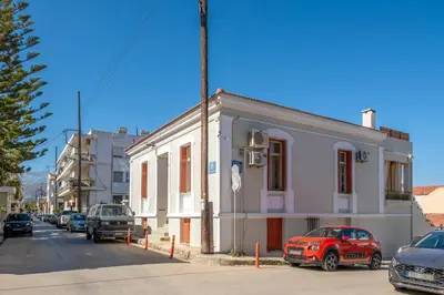 a white building on the side of a street at Le Nid The Nest of Beauty in Chania Town