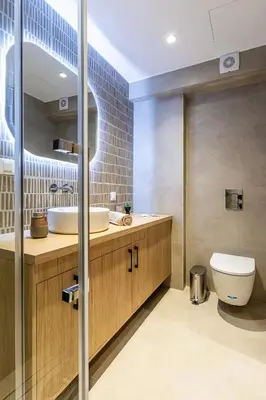 a bathroom with a toilet and a sink at Seatherial Apartments Paleochora in Palaiochóra